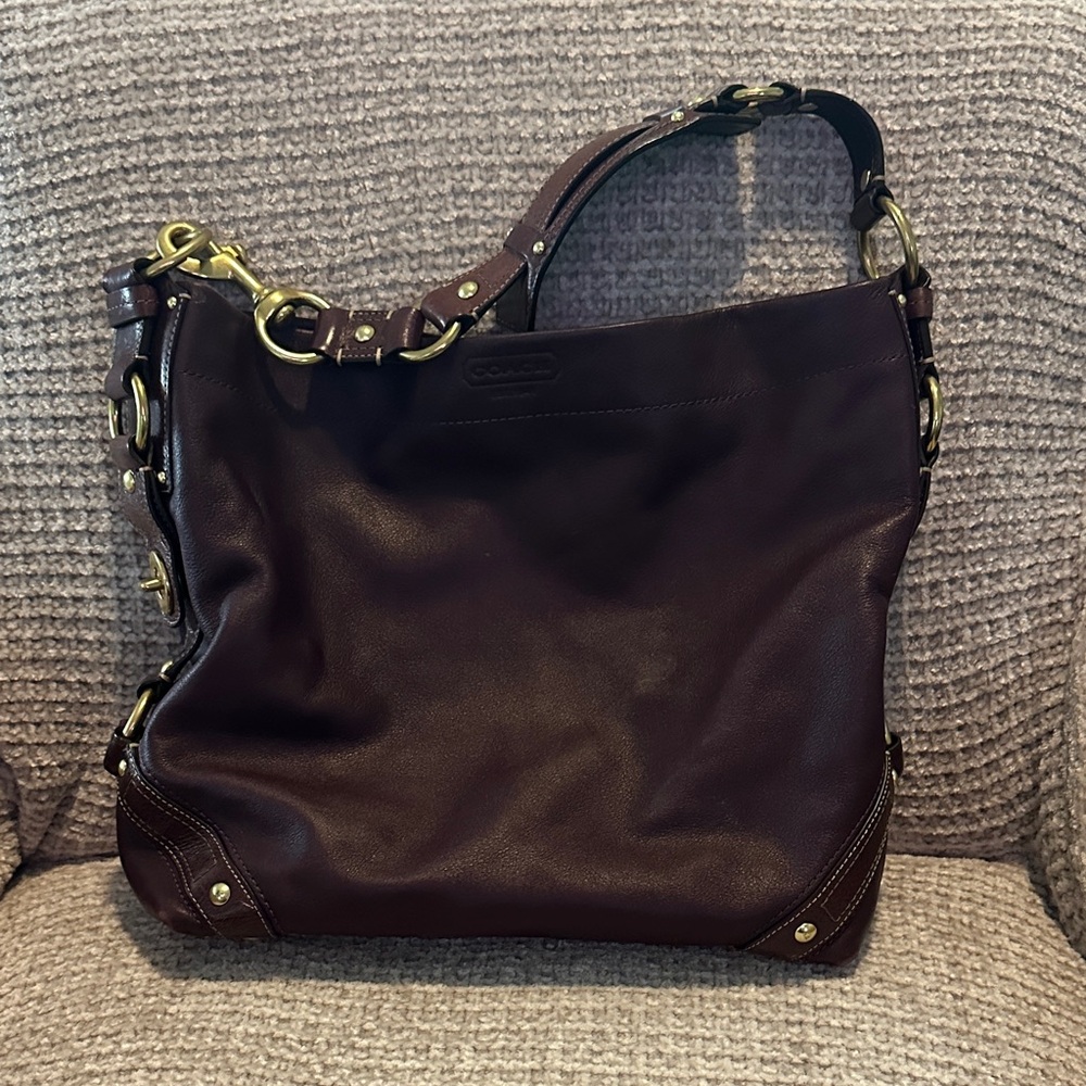Coach dark purple and gold hand bag
